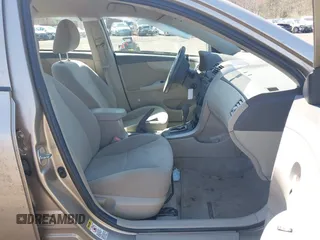 2009 Toyota Corolla with VIN 1NXBU40E09Z144942, listed as a IAAI auction lot 42051178 with 101,564 mi miles and . Bid and sale history available at DreamBid. Image 5.