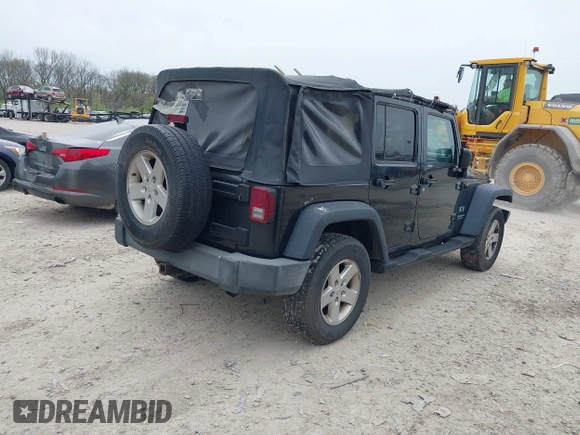 2007 Jeep Wrangler Unlimited X with VIN 1J4GA39177L153387, listed as a IAAI auction lot 42021211 with 207,965 mi miles and . Bid and sale history available at DreamBid. Image 4.