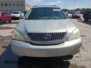 2005 Lexus RX 330 with VIN JTJGA31U350051558, listed as a Copart auction lot 60489215 with 216,702 mi miles and Salvage title. Bid and sale history available at DreamBid. Image 5.