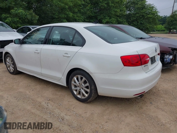 2014 Volkswagen Jetta SE with VIN 3VWD17AJ0EM371501, listed as a IAAI auction lot 42597170 with 166,686 mi miles and . Bid and sale history available at DreamBid. Image 3.