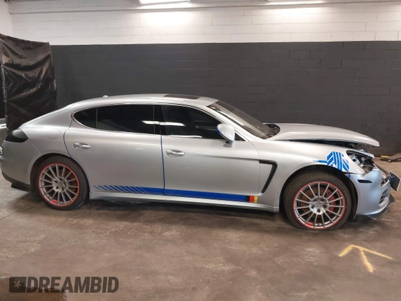2014 Porsche Panamera 4S Executive with VIN WP0BB2A77EL062088, listed as a IAAI auction lot 41696130 with 105,177 mi miles and . Bid and sale history available at DreamBid. Image 14.