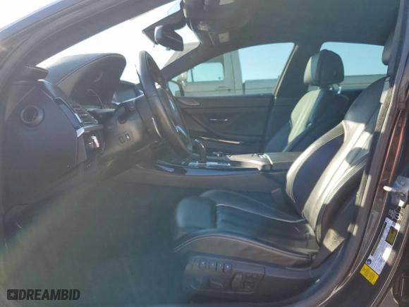 2015 BMW 6 Series 650i with VIN WBA6B2C58FD799063, listed as a Copart auction lot 77819914 with 0 mi miles and Salvage Title. Bid and sale history available at carsss.com. Image 7.