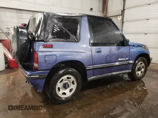 1995 Chevrolet Tracker z VIN 2CNBJ1866S6934268, wystawiony jako Copart lot #41997375 z przebiegiem 152 848 mil mil oraz Szkoda całkowita • Salvage title. Historia ofert i sprzedaży dostępna na DreamBid. Obrazek 3.