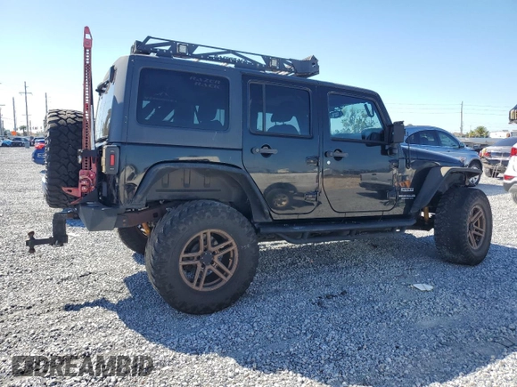 2014 Jeep Wrangler Unlimited Sport with VIN 1C4BJWDGXEL269693, listed as a Copart auction lot 46927895 with 105,691 mi miles and Salvage Title. Bid and sale history available at carsss.com. Image 3.