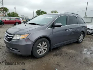 2015 Honda Odyssey EX-L z VIN 5FNRL5H60FB129449, wystawiony jako Copart lot #57521495 z przebiegiem 212 901 mil mil oraz Szkoda całkowita • Salvage title. Historia ofert i sprzedaży dostępna na DreamBid. Obrazek 1.