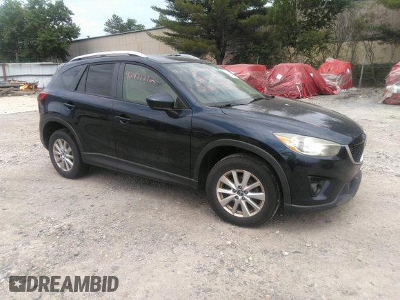 2014 Mazda CX-5 Touring z VIN JM3KE2CYXE0429149, wystawiony jako IAAI lot #42471772 z przebiegiem 222 440 mil mil oraz . Historia ofert i sprzedaży dostępna na DreamBid. Obrazek 1.