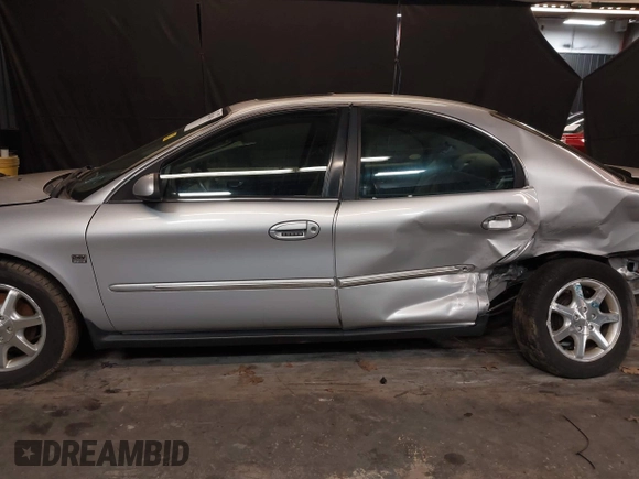 2002 Mercury Sable LS Premium with VIN 1MEFM55S32A612145, listed as a IAAI auction lot 41744306 with 84,865 mi miles and . Bid and sale history available at DreamBid. Image 14.