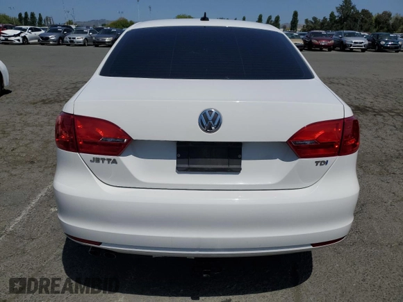 2014 Volkswagen Jetta TDI w/Premium with VIN 3VW3L7AJ4EM372687, listed as a Copart auction lot 55284225 with 95,645 mi miles and Salvage title. Bid and sale history available at DreamBid. Image 6.