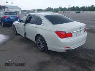 2011 BMW 7 Series 750i with VIN WBAKA8C56BCY37281, listed as a IAAI auction lot 42637801 with 122,263 mi miles and . Bid and sale history available at DreamBid. Image 3.