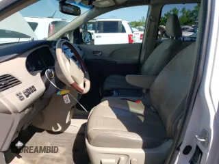 2014 Toyota Sienna XLE with VIN 5TDYK3DC6ES427920, listed as a Copart auction lot 54075594 with 127,018 mi miles and Salvage title. Bid and sale history available at DreamBid. Image 7.