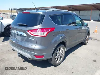2014 Ford Escape Titanium с VIN 1FMCU0J95EUC22897, выставлен на аукционе IAAI как лот 42204135 с пробегом 144 534 миль миль и . История ставок и продаж доступна на DreamBid. Изображение 4.