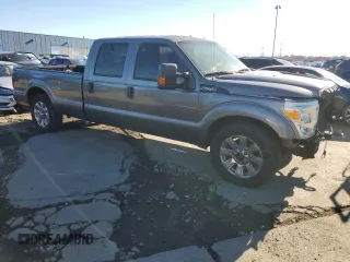 2012 Ford F-250 XL with VIN 1FT7W2A68CED01876, listed as a Copart auction lot 79629364 with 114,793 mi miles and Salvage title. Bid and sale history available at DreamBid. Image 4.