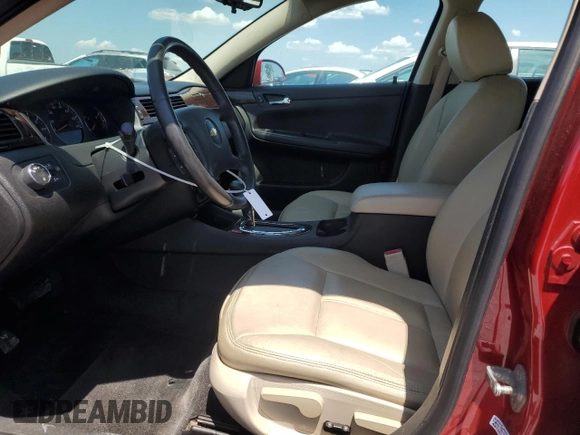 2012 Chevrolet Impala LT Retail with VIN 2G1WB5E38C1320432, listed as a Copart auction lot 54502495 with 113,217 mi miles and Salvage Title. Bid and sale history available at DreamBid. Image 7.