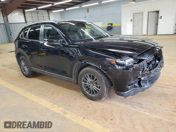 2019 Mazda CX-5 Touring with VIN JM3KFBCM4K0571793, listed as a Copart auction lot 49696825 with 97,305 mi miles and Salvage Title. Bid and sale history available at carsss.com. Image 4.