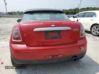 2013 MINI Cooper Coupe with VIN WMWSX1C57DT507660, listed as a Copart auction lot 63930314 with 119,945 mi miles and Non Repairable. Bid and sale history available at carsss.com. Image 6.