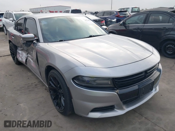 2015 Dodge Charger SXT with VIN 2C3CDXHG4FH884058, listed as a IAAI auction lot 41724894 with 202,701 mi miles and . Bid and sale history available at DreamBid. Image 1.