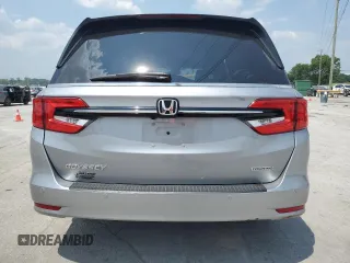 2023 Honda Odyssey Touring z VIN 5FNRL6H8XPB037385, wystawiony jako Copart lot #59461215 z przebiegiem 32 150 mil mil oraz Szkoda całkowita • Salvage title. Historia ofert i sprzedaży dostępna na DreamBid. Obrazek 6.