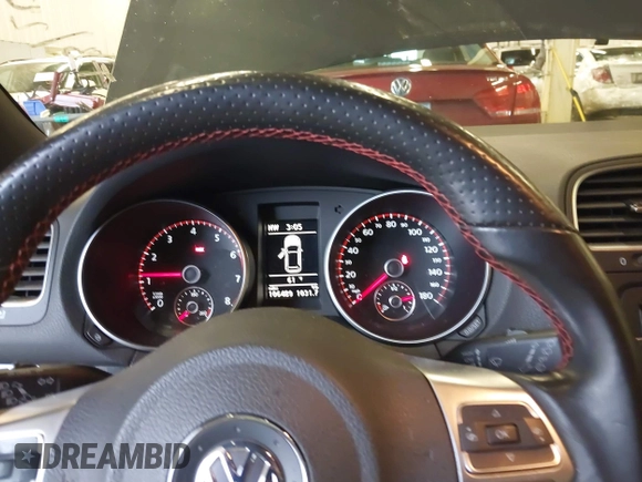 2012 Volkswagen GTI w/Sunroof & Navi PZEV with VIN WVWGD7AJ2CW100248, listed as a IAAI auction lot 41905190 with 106,489 mi miles and . Bid and sale history available at DreamBid. Image 7.