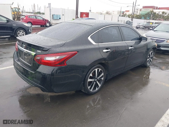 2018 Nissan Altima 2.5 SV with VIN 1N4AL3AP9JC117719, listed as a IAAI auction lot 41720521 with 103,541 mi miles. Bid and sale history available at carsss.com. Image 4.