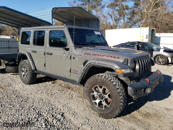 2020 Jeep Wrangler Unlimited Rubicon with VIN 1C4HJXFG7LW187302, listed as a Copart auction lot 87731575 with 80,564 mi miles and Salvage Title. Bid and sale history available at carsss.com. Image 4.