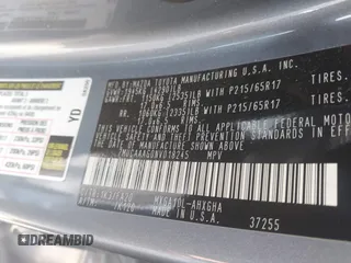 2022 Toyota Corolla Cross LE with VIN 7MUCAAAG0NV018245, listed as a IAAI auction lot 42039762 with 26,690 mi miles and . Bid and sale history available at DreamBid. Image 9.