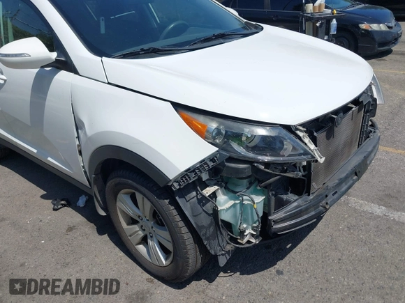 2013 Kia Sportage LX with VIN KNDPB3A23D7514304, listed as a IAAI auction lot 42544397 with 82,456 mi miles and . Bid and sale history available at DreamBid. Image 6.