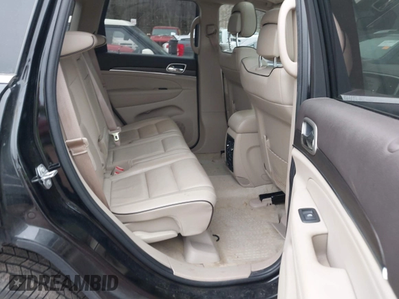 2017 Jeep Grand Cherokee Overland z VIN 1C4RJECG4HC878258, wystawiony jako IAAI lot #41361352 z przebiegiem 137 574 mil mil oraz . Historia ofert i sprzedaży dostępna na DreamBid. Obrazek 8.