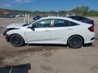 2021 Honda Civic LX z VIN 2HGFC2F66MH505486, wystawiony jako IAAI lot #42285293 z przebiegiem 92 049 mil mil oraz . Historia ofert i sprzedaży dostępna na DreamBid. Obrazek 14.