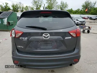 2014 Mazda CX-5 Touring z VIN JM3KE4CY2E0368729, wystawiony jako Copart lot #55563645 z przebiegiem 204 521 mil mil oraz Szkoda całkowita • Salvage title. Historia ofert i sprzedaży dostępna na DreamBid. Obrazek 6.