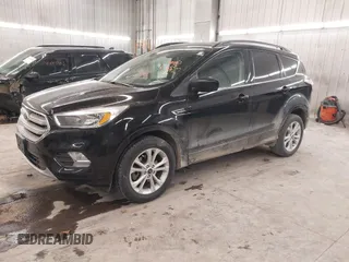 2018 Ford Escape SE z VIN 1FMCU9GD0JUC25636, wystawiony jako IAAI lot #40996760 z przebiegiem 70 097 mil mil oraz . Historia ofert i sprzedaży dostępna na DreamBid. Obrazek 18.