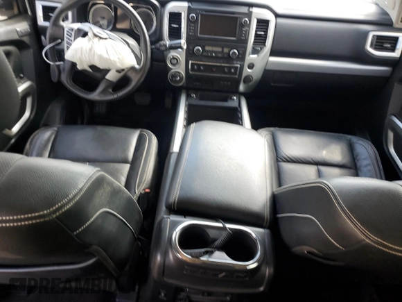 2019 Nissan Titan Pro-4X z VIN 1N6AA1E51KN526104, wystawiony jako Copart lot #51694335 z przebiegiem 56 620 mil mil oraz Szkoda całkowita • Salvage title. Historia ofert i sprzedaży dostępna na DreamBid. Obrazek 8.