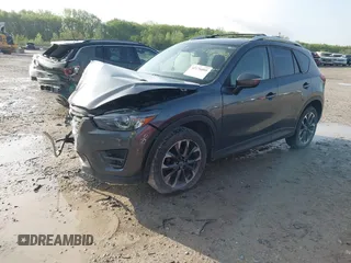 2016 Mazda CX-5 Grand Touring with VIN JM3KE4DYXG0724183, listed as a IAAI auction lot 42176009 with 152,695 mi miles and . Bid and sale history available at DreamBid. Image 17.