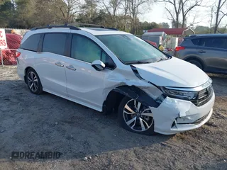 2024 Honda Odyssey Touring z VIN 5FNRL6H89RB022833, wystawiony jako IAAI lot #41904246 z przebiegiem 9 467 mil mil oraz . Historia ofert i sprzedaży dostępna na DreamBid. Obrazek 1.