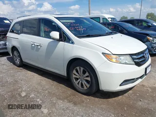 2014 Honda Odyssey EX-L with VIN 5FNRL5H69EB048867, listed as a IAAI auction lot 42190464 with 172,487 mi miles and . Bid and sale history available at carsss.com. Image 1.