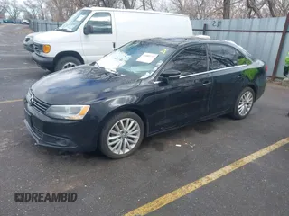 2014 Volkswagen Jetta TDI w/Premium with VIN 3VWLL7AJ3EM276789, listed as a IAAI auction lot 41805737 with 160,500 mi miles and . Bid and sale history available at DreamBid. Image 2.