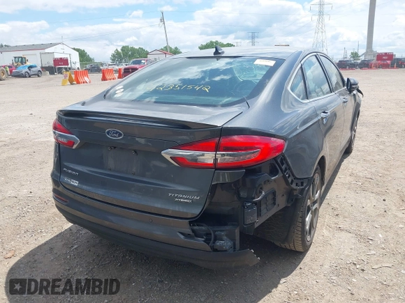 2020 Ford Fusion Titanium with VIN 3FA6P0RUXLR182120, listed as a IAAI auction lot 42351542 with 141,746 mi miles and . Bid and sale history available at DreamBid. Image 4.
