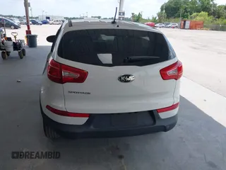 2013 Kia Sportage LX z VIN KNDPB3A2XD7521010, wystawiony jako IAAI lot #42297975 z przebiegiem 134 826 mil mil oraz . Historia ofert i sprzedaży dostępna na DreamBid. Obrazek 17.
