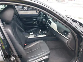 2014 BMW 3 Series 320i with VIN WBA3B1G52ENS80039, listed as a IAAI auction lot 42253717 with 104,388 mi miles and . Bid and sale history available at DreamBid. Image 5.