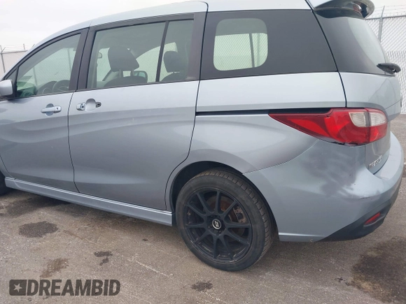 2012 Mazda 5 Touring with VIN JM1CW2CL7C0115096, listed as a IAAI auction lot 42524956 with 173,155 mi miles and . Bid and sale history available at DreamBid. Image 6.