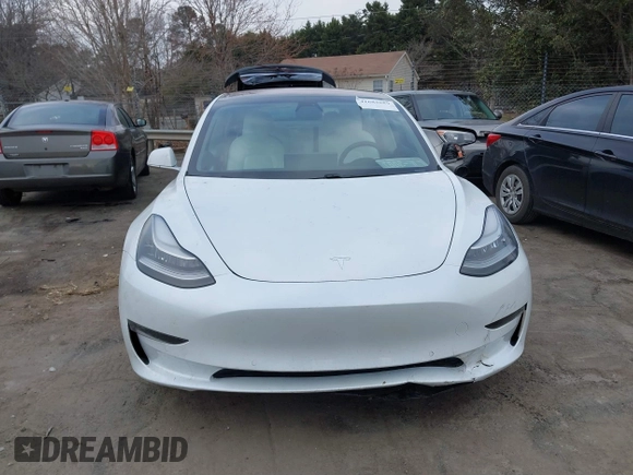 2018 Tesla Model 3 Long Range Battery with VIN 5YJ3E1EB4JF086012, listed as a IAAI auction lot 41683859 with 52,059 mi miles and . Bid and sale history available at DreamBid. Image 12.