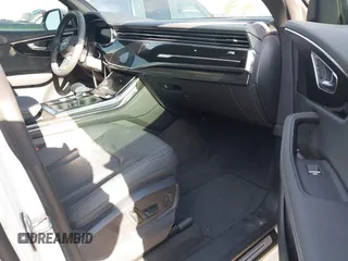 2024 Audi Q8 Premium Plus z VIN WA1BVBF19RD018552, wystawiony jako IAAI lot #41857441 z przebiegiem 3 188 mil mil oraz . Historia ofert i sprzedaży dostępna na DreamBid. Obrazek 5.