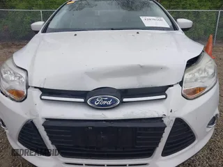 2012 Ford Focus SE with VIN 1FAHP3F21CL201889, listed as a IAAI auction lot 42070260 with 126,650 mi miles. Bid and sale history available at carsss.com. Image 6.