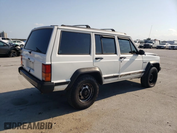 1996 Jeep Cherokee SE with VIN 1J4FT28S3TL197827, listed as a Copart auction lot 75443574 with 116,660 mi miles and Salvage Title. Bid and sale history available at carsss.com. Image 3.