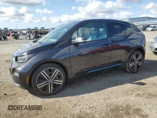 2014 BMW i3 with VIN WBY1Z2C58EV285102, listed as a Copart auction lot 42879385 with 58,002 mi miles and Salvage Title. Bid and sale history available at carsss.com. Image 1.