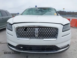 2022 Lincoln Nautilus Reserve z VIN 2LMPJ8K95NBL24072, wystawiony jako IAAI lot #41824694 z przebiegiem Nie podano mil oraz . Historia ofert i sprzedaży dostępna na DreamBid. Obrazek 11.