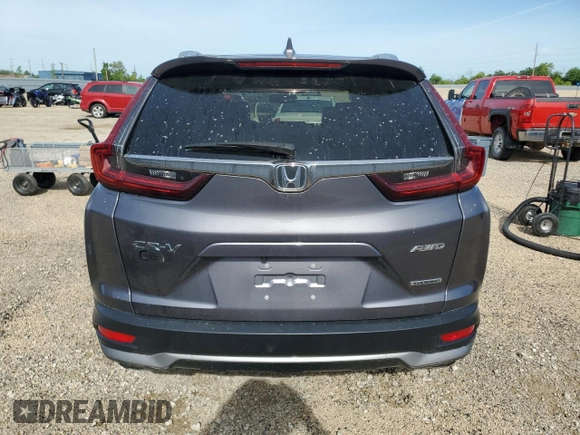 2020 Honda CR-V Touring with VIN 2HKRW2H99LH677964, listed as a Copart auction lot 61169915 with 65,915 mi miles and Salvage title. Bid and sale history available at DreamBid. Image 6.