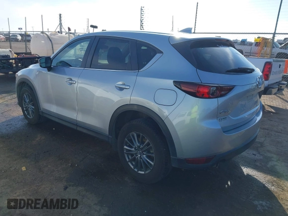 2020 Mazda CX-5 Touring with VIN JM3KFACM1L0789394, listed as a IAAI auction lot 41565887 with 73,730 mi miles. Bid and sale history available at carsss.com. Image 3.