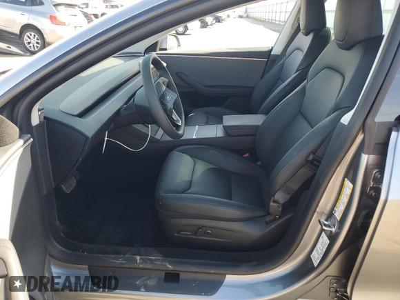 2025 Tesla Model 3 Long Range with VIN 5YJ3E1EA8SF890337, listed as a Copart auction lot 45023425 with 1,765 mi miles and Salvage Title. Bid and sale history available at DreamBid. Image 7.