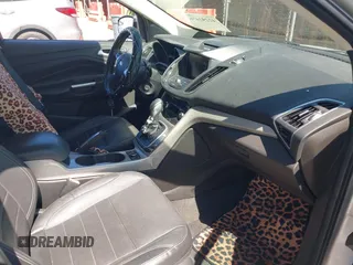 2013 Ford Escape SEL with VIN 1FMCU9HX0DUD42081, listed as a IAAI auction lot 42293456 with 100,013 mi miles and . Bid and sale history available at DreamBid. Image 5.
