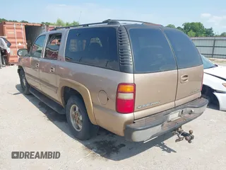 2001 Chevrolet Suburban LS z VIN 3GNEC16T21G214738, wystawiony jako IAAI lot #42433747 z przebiegiem Nie podano mil oraz . Historia ofert i sprzedaży dostępna na DreamBid. Obrazek 3.